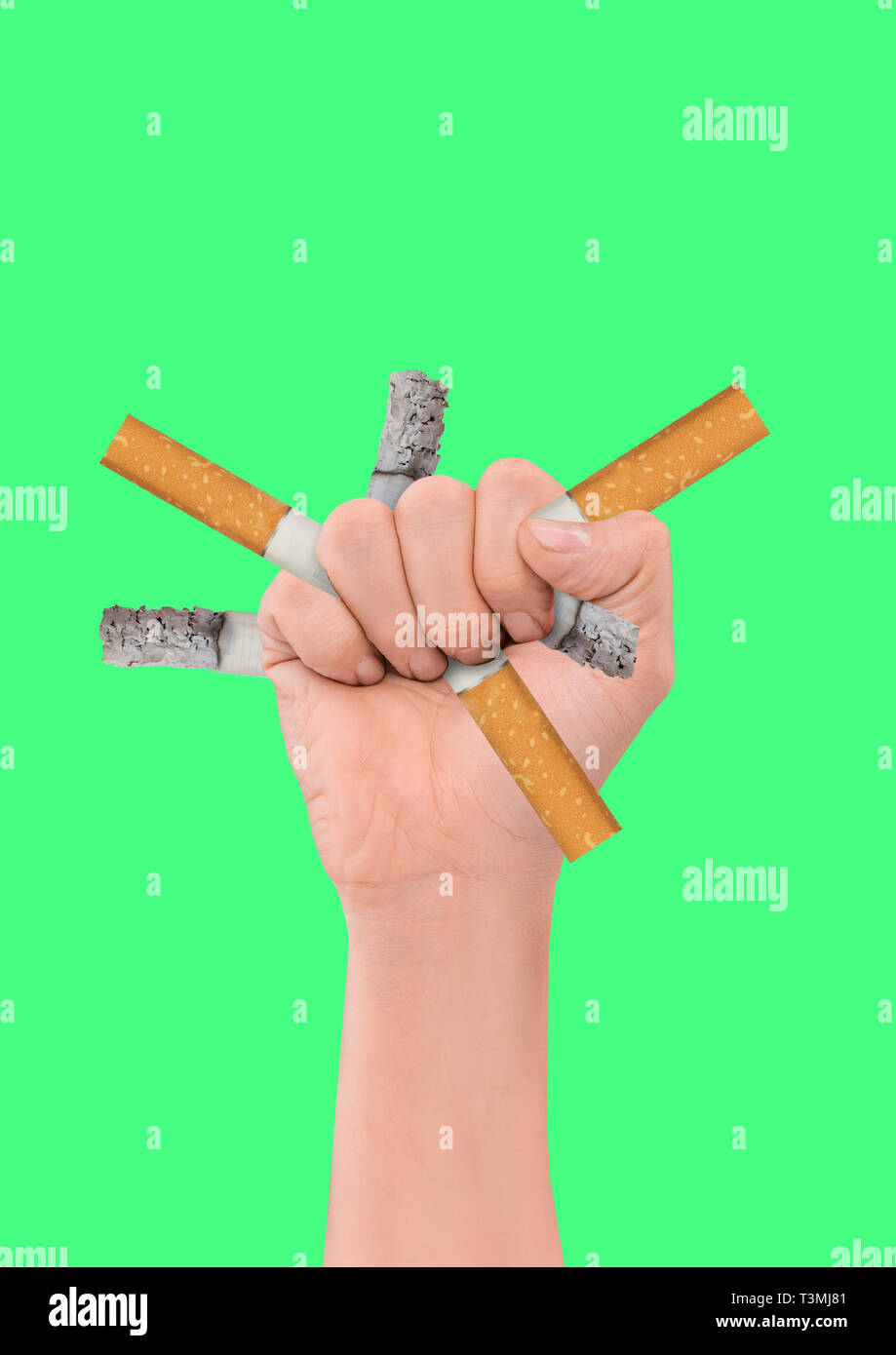 Fight with your sins. Male hand holding cigarettes in his fist against  green background. Modern design. Contemporary art collage. Concept of no  tobacco day, healthy lifestyle, smoking rejection Stock Photo - Alamy