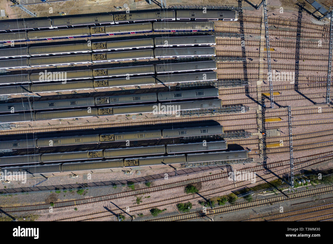 Aerial view over passenger trains in rows at a station Stock Photo Alamy