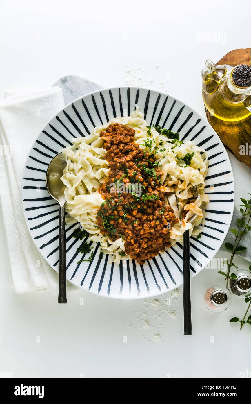 Family eating spaghetti bolognese hires stock photography and images