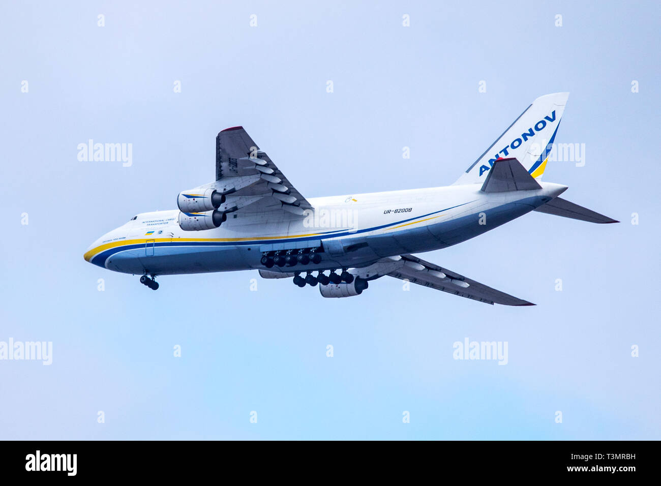 An Antonov Design Bureau UR - 82008 airlines cargo plane comes into land as it approaches Blackpool airfield, UK Stock Photo