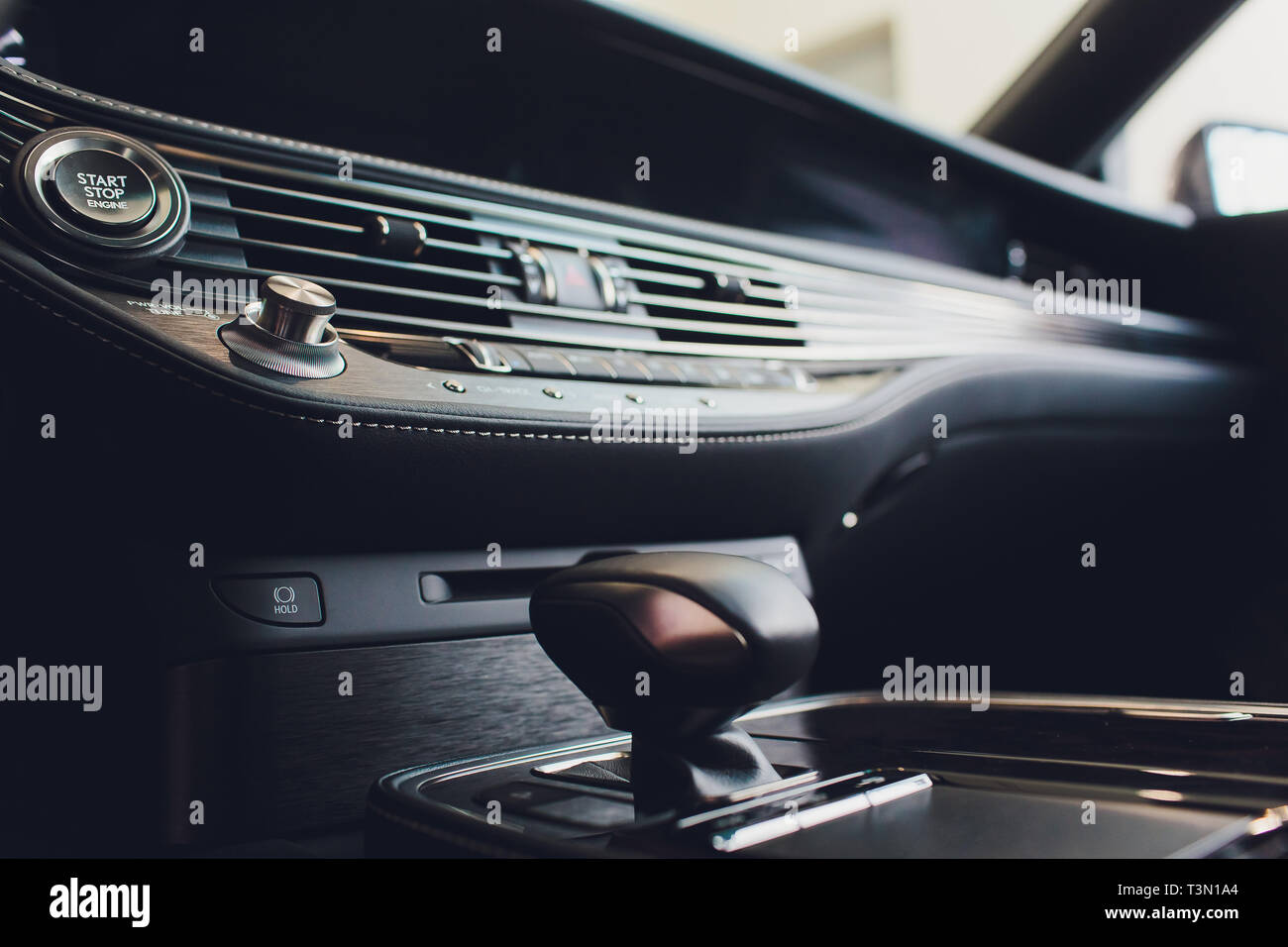 Detail of modern car interior, gear stick, automatic transmission in