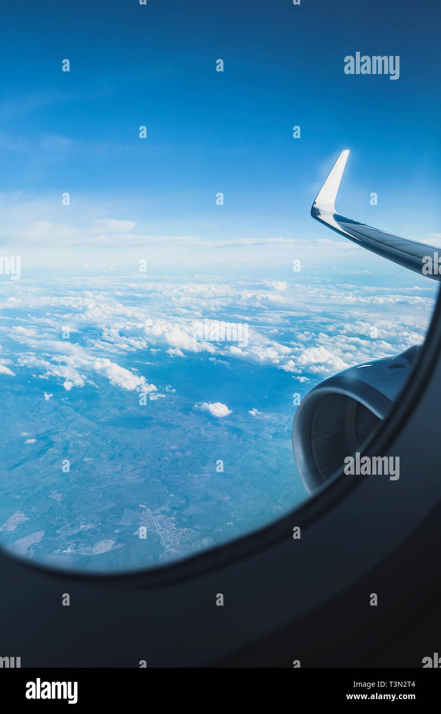 View through the window of a airplane during flight of the wing ...