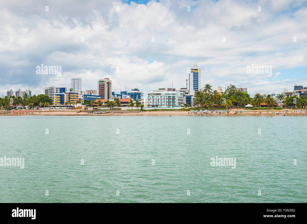 View to the Praia do Bessa beach and the beachfront buildings of the city of Joao Pessoa. Beachfront city. Stock Photo