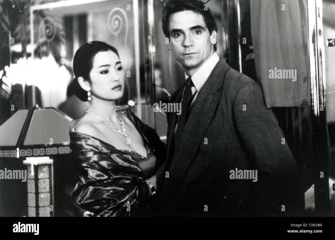Actors Gong Li and Jeremy Irons in the movie Chinese Box, 1997 Stock Photo  - Alamy