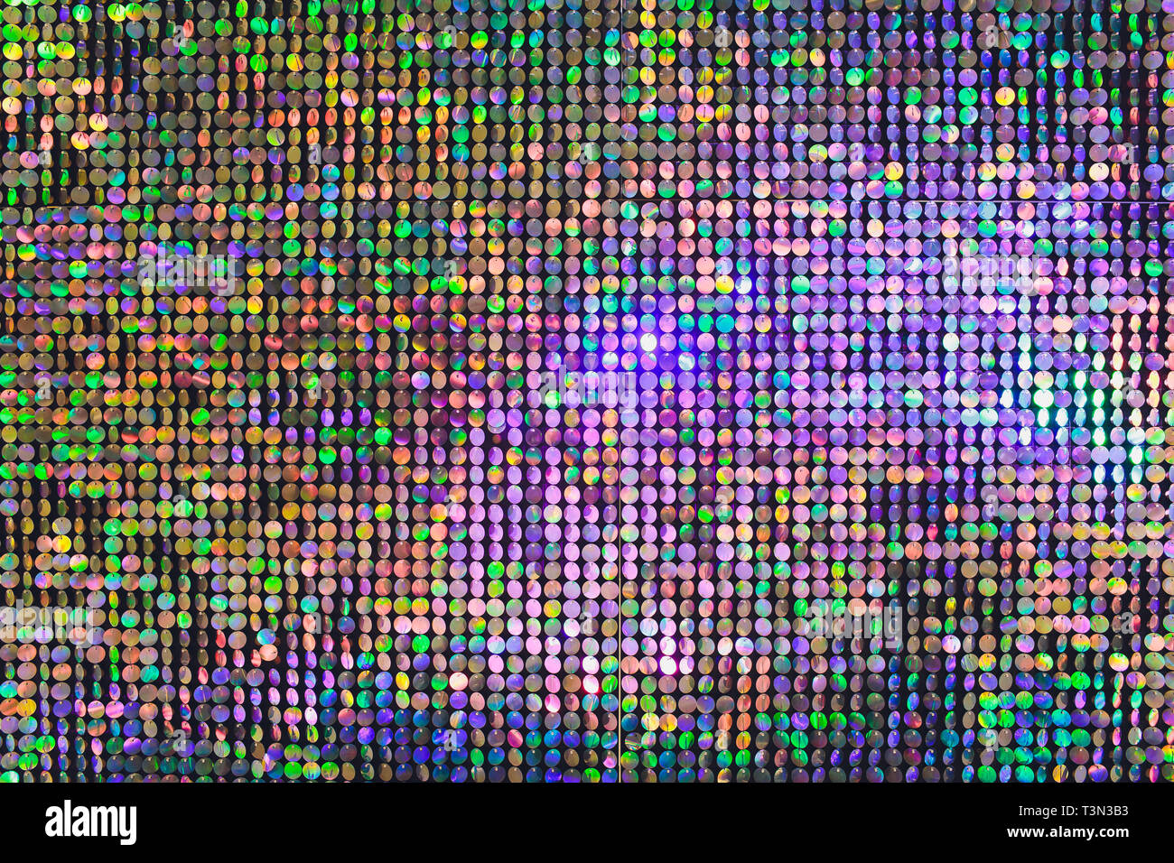 multicolor glitter wallpaper in top view with shiny particles
