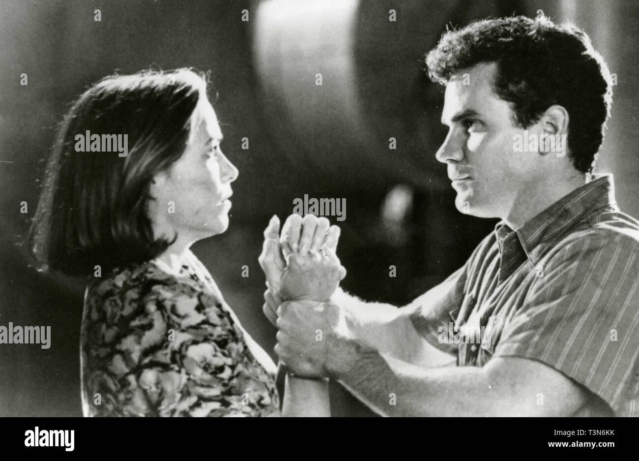 Karen Allen and Ted Marcoux in the movie Ghost in the Machine, 1993 Stock Photo