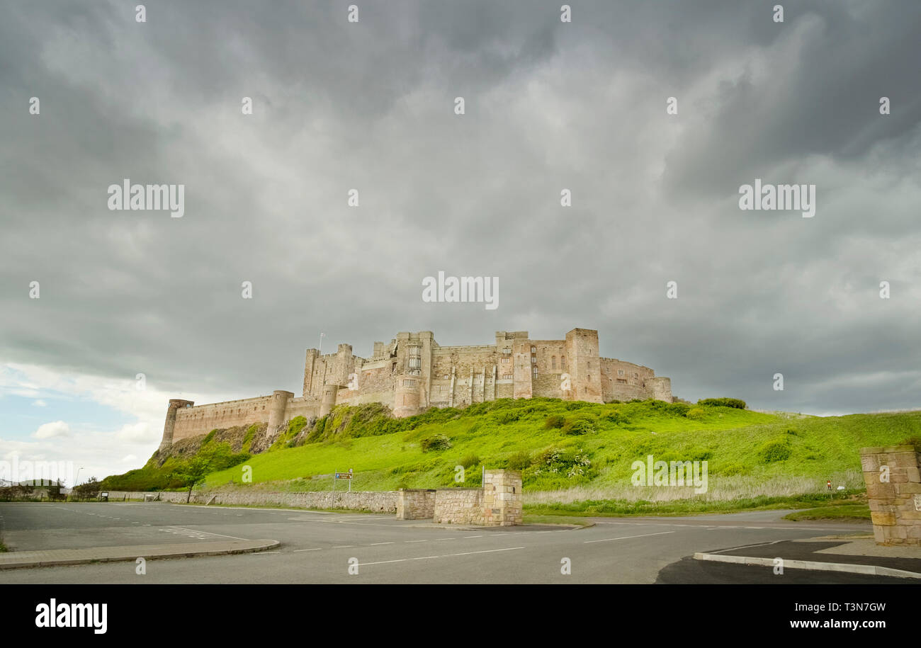 Bamburgh castle and stormy sky from the south car park, Northumberland, England, UK  (May 2017) Stock Photo