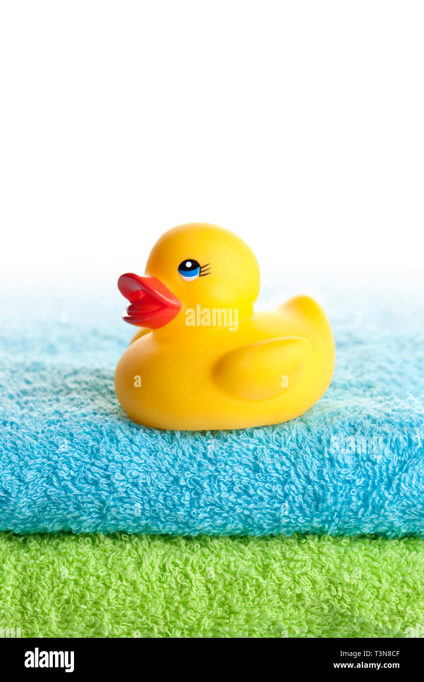 rubber duck on towels stack Stock Photo