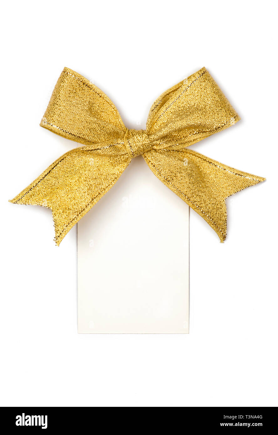 Golden ribbon with bow and card isolated on white Stock Photo