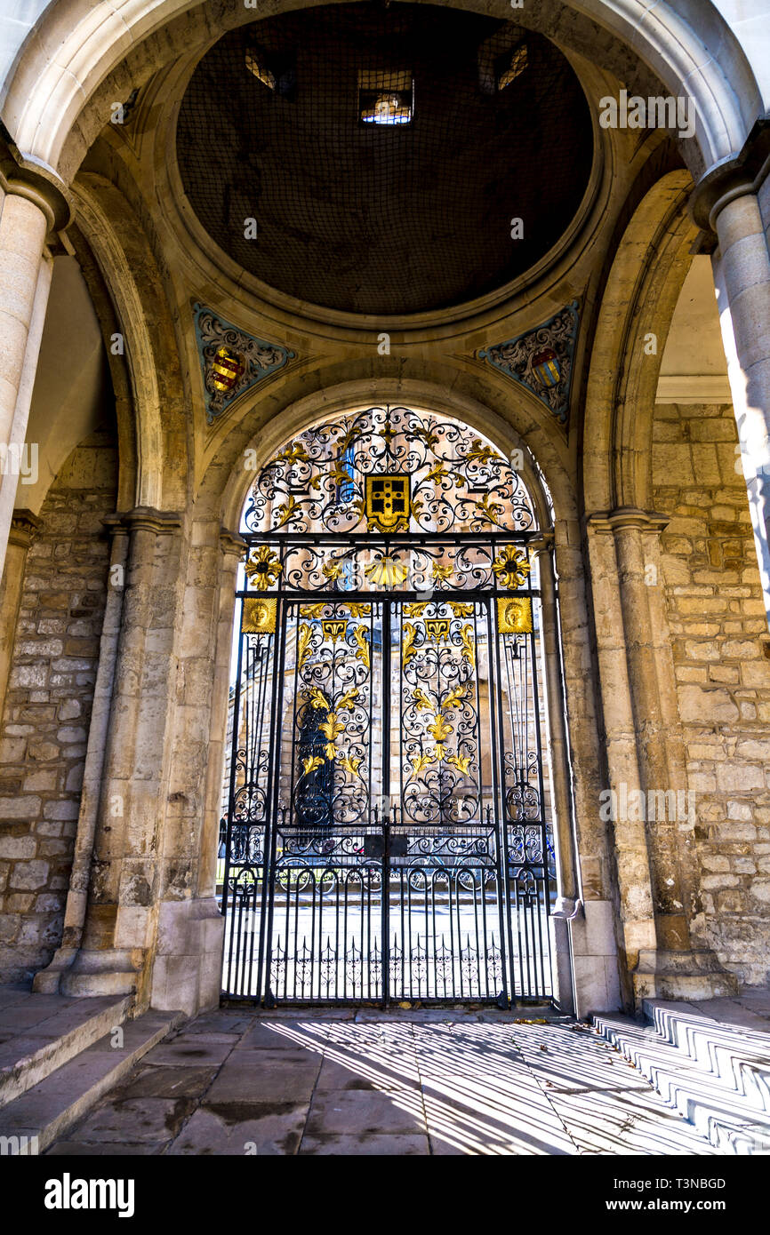 Ornate gilded wrought iron gate at the Radcliffe Square entrance to All Souls College, Oxford, UK Stock Photo