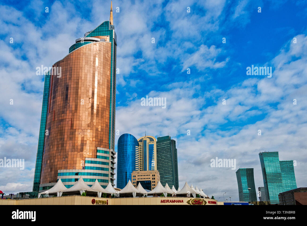 The tall skyscraper housing the Ministry of Transport and Communication,  nicknamed Cigarette Lighter or Swordfish, Astana, Kazakhstan Stock Photo
