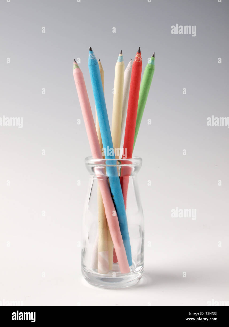 colorful pencils in a glass bottle Stock Photo Alamy