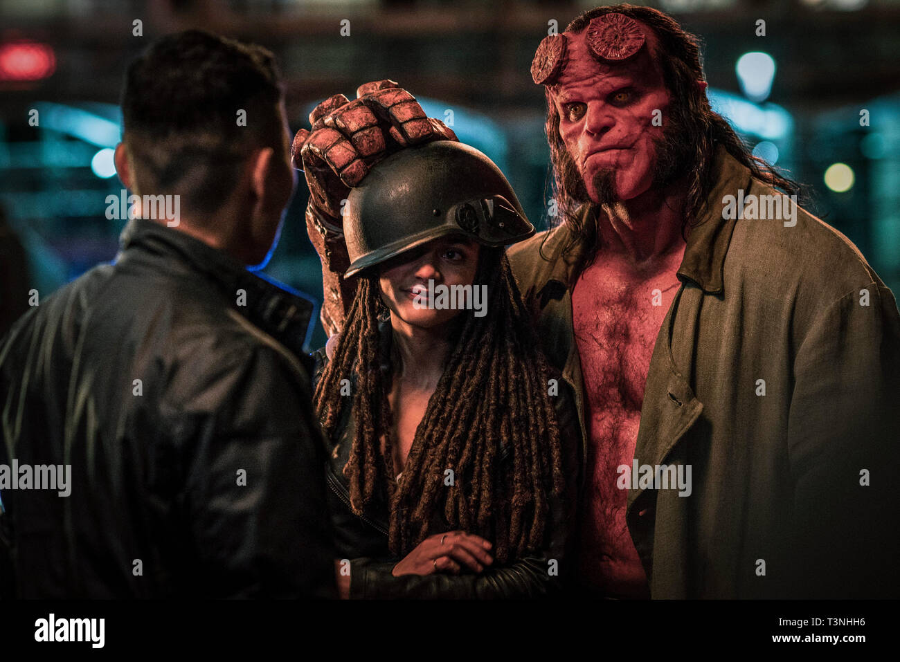 RELEASE DATE: April 12, 2019 TITLE: Hellboy STUDIO: Lionsgate DIRECTOR: Neil Marshall PLOT: Based on the graphic novels by Mike Mignola, Hellboy, caught between the worlds of the supernatural and human, battles an ancient sorceress bent on revenge. STARRING: DANIEL DAY KIM as Ben Daimio, SASHA LANE as Alice Monoghan, DAVID HARBOUR as Hellboy. (Credit Image: © Lionsgate/Entertainment Pictures) Stock Photo