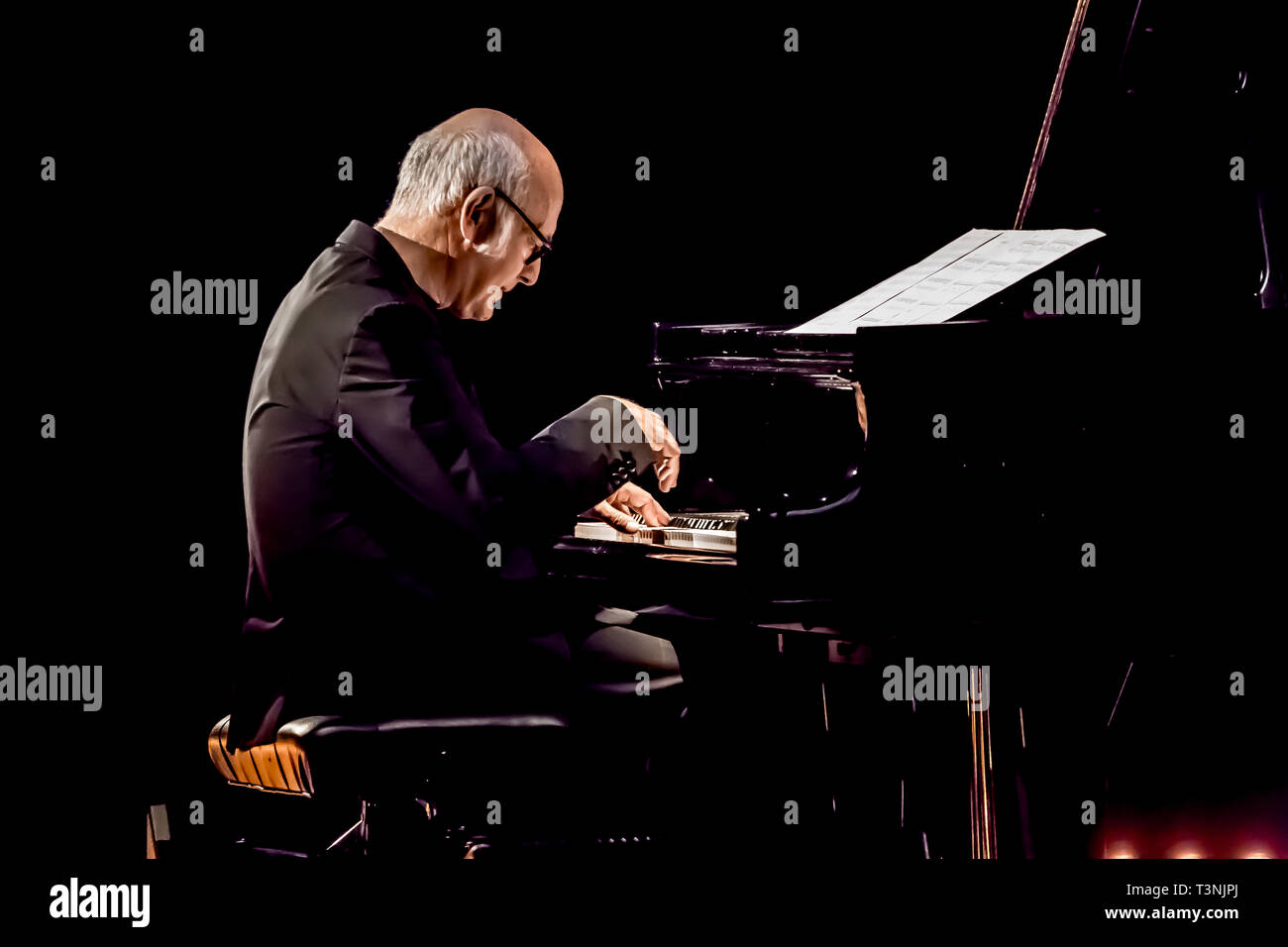 Parma, Italy. 10th Apr, 2019. After the success of the ‘ensemble' concert in the 2015 edition, Ludovico Einaudi, famous Italian composer and pianist, Wednesday 10 April 2019 at 9.00 pm returns to the Teatro Regio di Parma with his new international tour, starting in March. Ludovico Einaudi, born in Turin in 1955, is an Italian composer and pianist known and appreciated throughout the world for his concerts, his famous soundtracks and his recording career. Credit: Luigi Rizzo/Pacific Press/Alamy Live News Stock Photo
