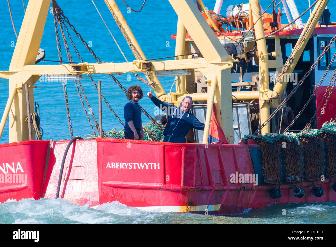 Aberystwyth Wales, UK. 11th Apr, 2019. UK Weather: Local inshore fishermen out in their scallop fishing boat on the calm sea on a gloriously bright and sunny morning in Aberystwyth on the Cardigan Bay coast of west Wales.  Credit: keith morris/Alamy Live News Stock Photo