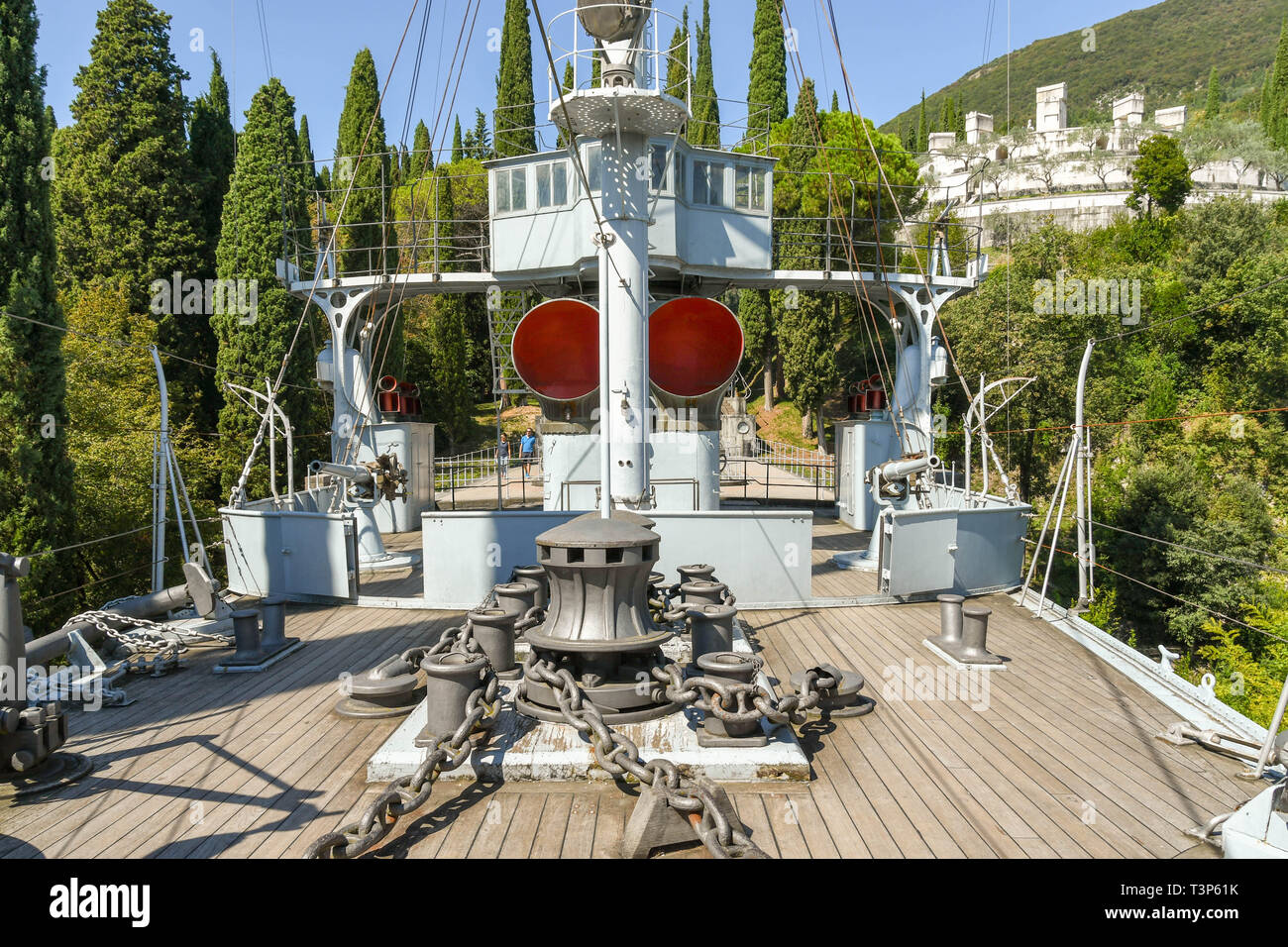 GARDONE RIVIERA, ITALY - SEPTEMBER 2018: The deck and bridge of the cruiser Puglia, preserved on display in the Vittoriale degli Italiani garden Stock Photo