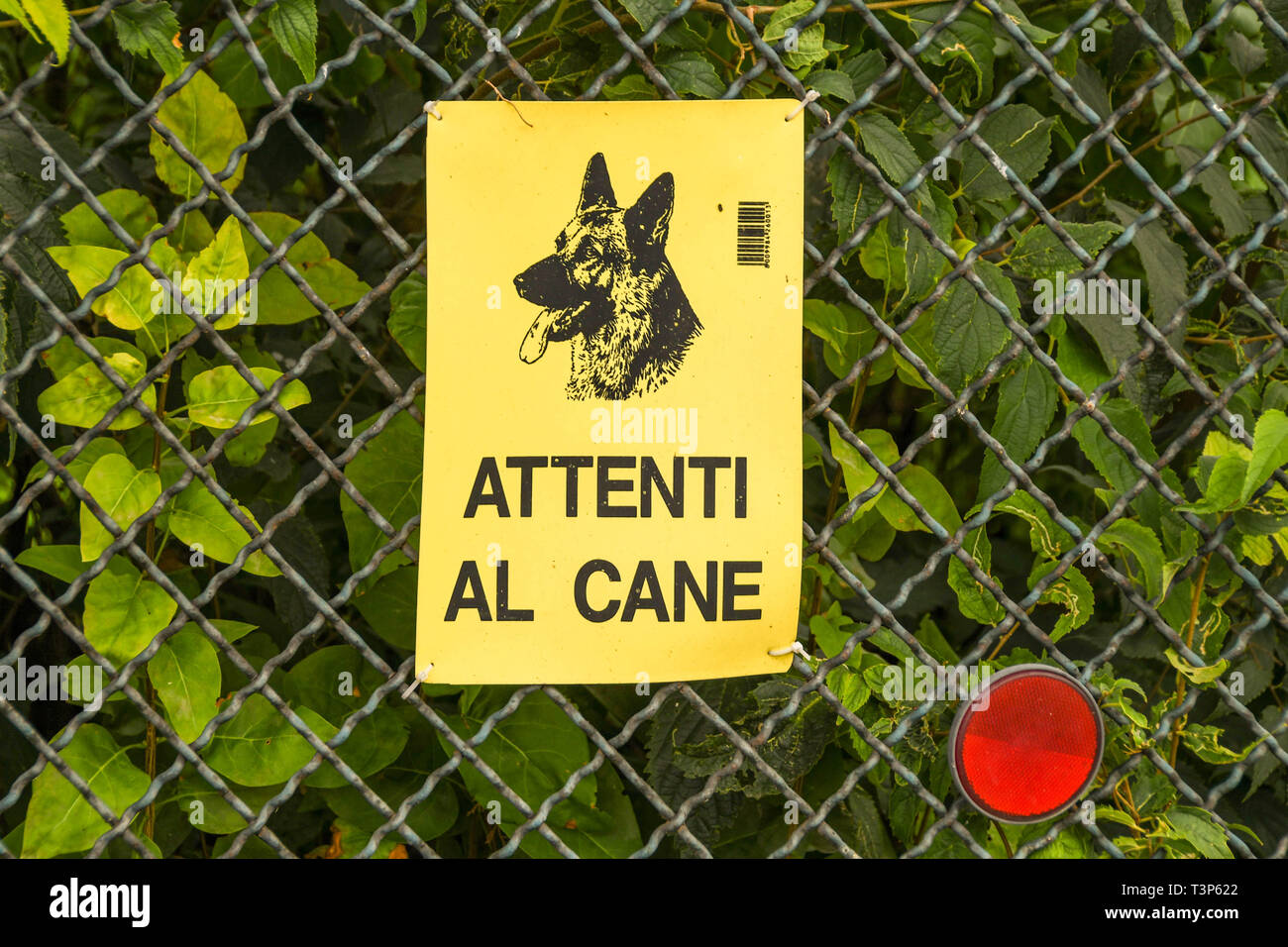 GARDA, ITALY - SEPTEMBER 2018: Sign warning of a guard dog on a property Stock Photo