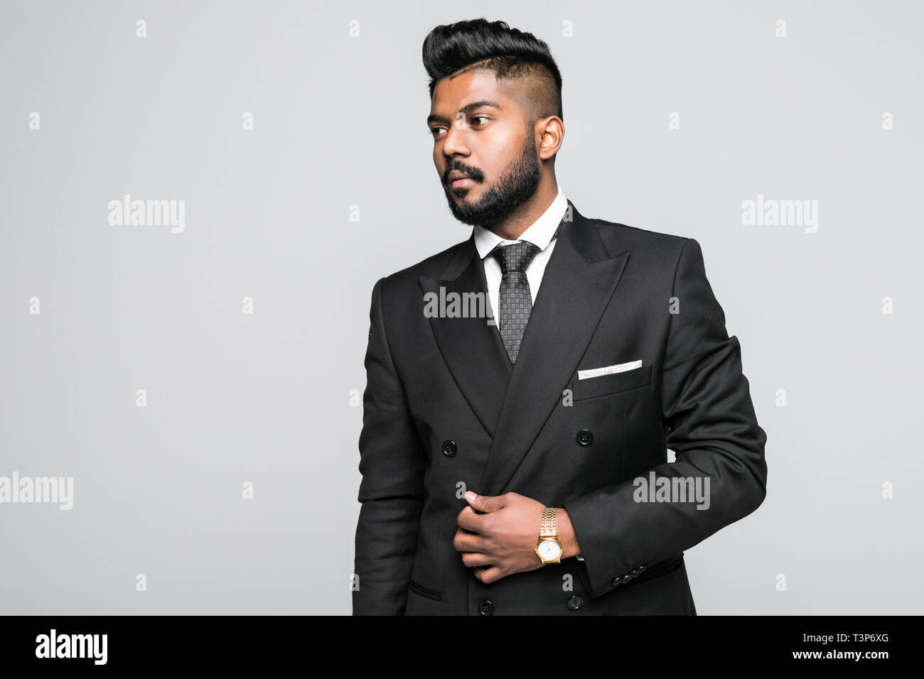 Portrait of confident, smiling indian businessman with arms crossed ...