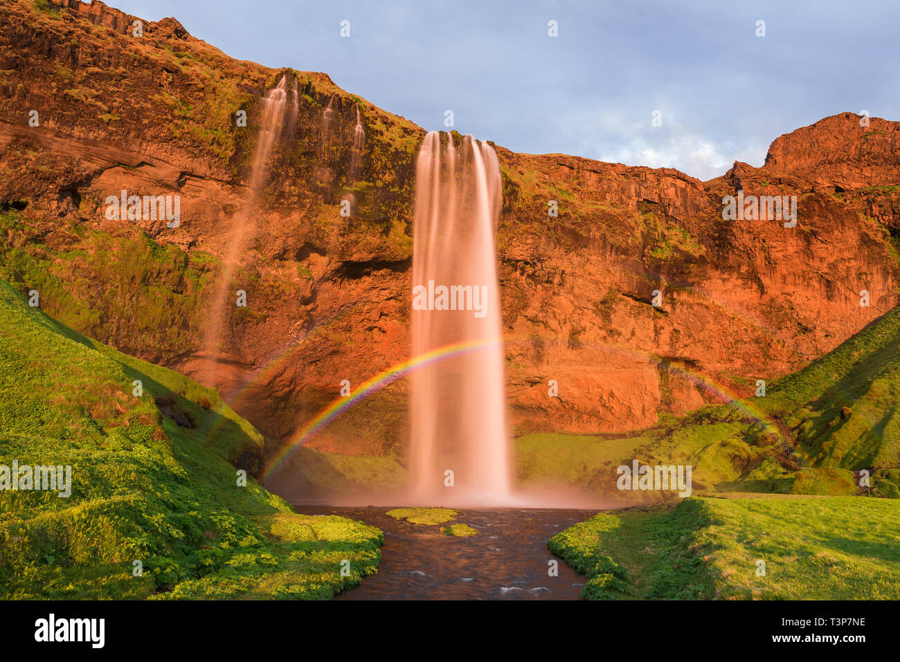 Seljalandsfoss waterfall. Summer landscape with a rainbow and a river ...