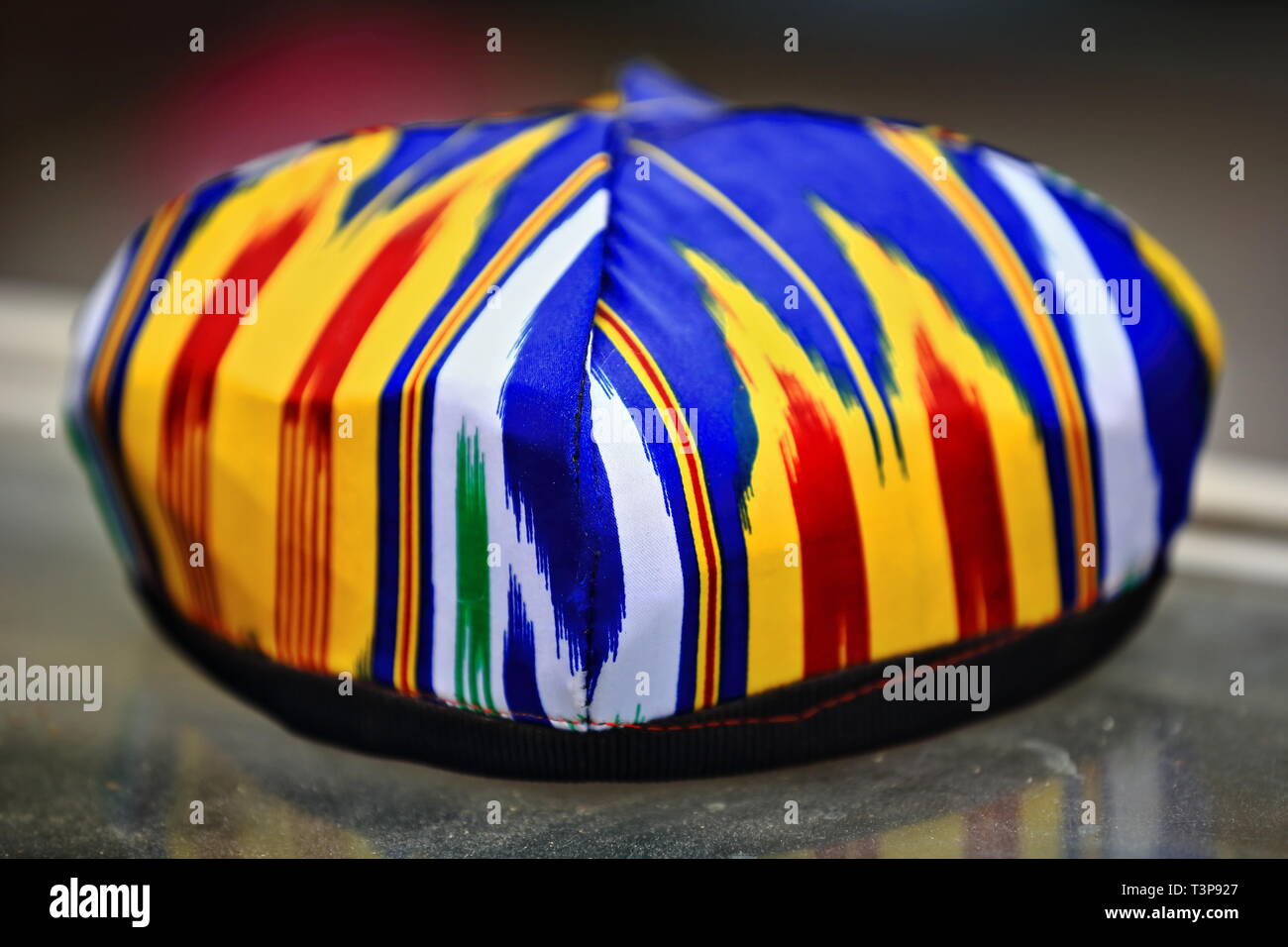 Colorful doppa-skullcap at Hotan's Sunday market. Xinjiang Uyghur ...