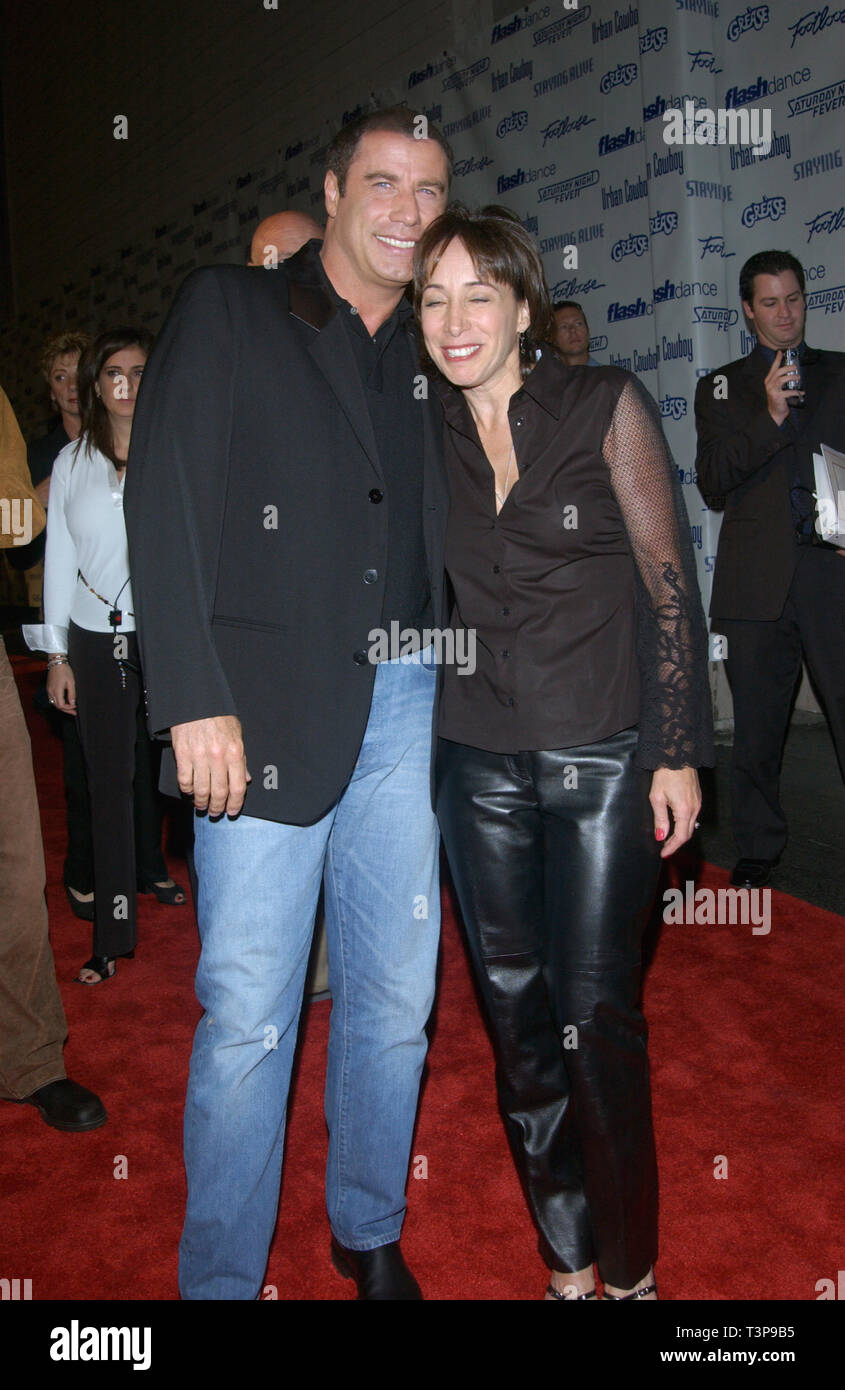 LOS ANGELES, CA. September 24, 2002: Actor JOHN TRAVOLTA (Grease, Saturday Night Fever, Urban Cowboy) & actress DIDI CONN (Grease) at Paramount Reunion party in Hollywood.  The party was held to celebrate the DVD release of Paramount musicals Saturday Night Fever, Grease, Flashdance, Footloose, Urban Cowboy, and Staying Alive. © Paul Smith / Featureflash Stock Photo
