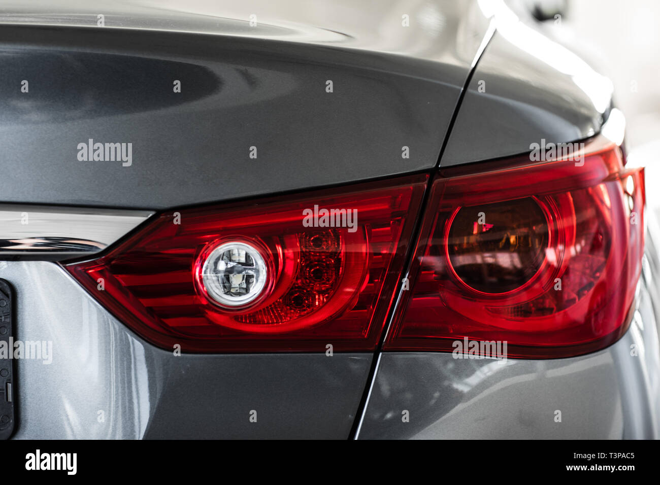 Back lights of black car. Car headlight. the back of the car Stock Photo -  Alamy