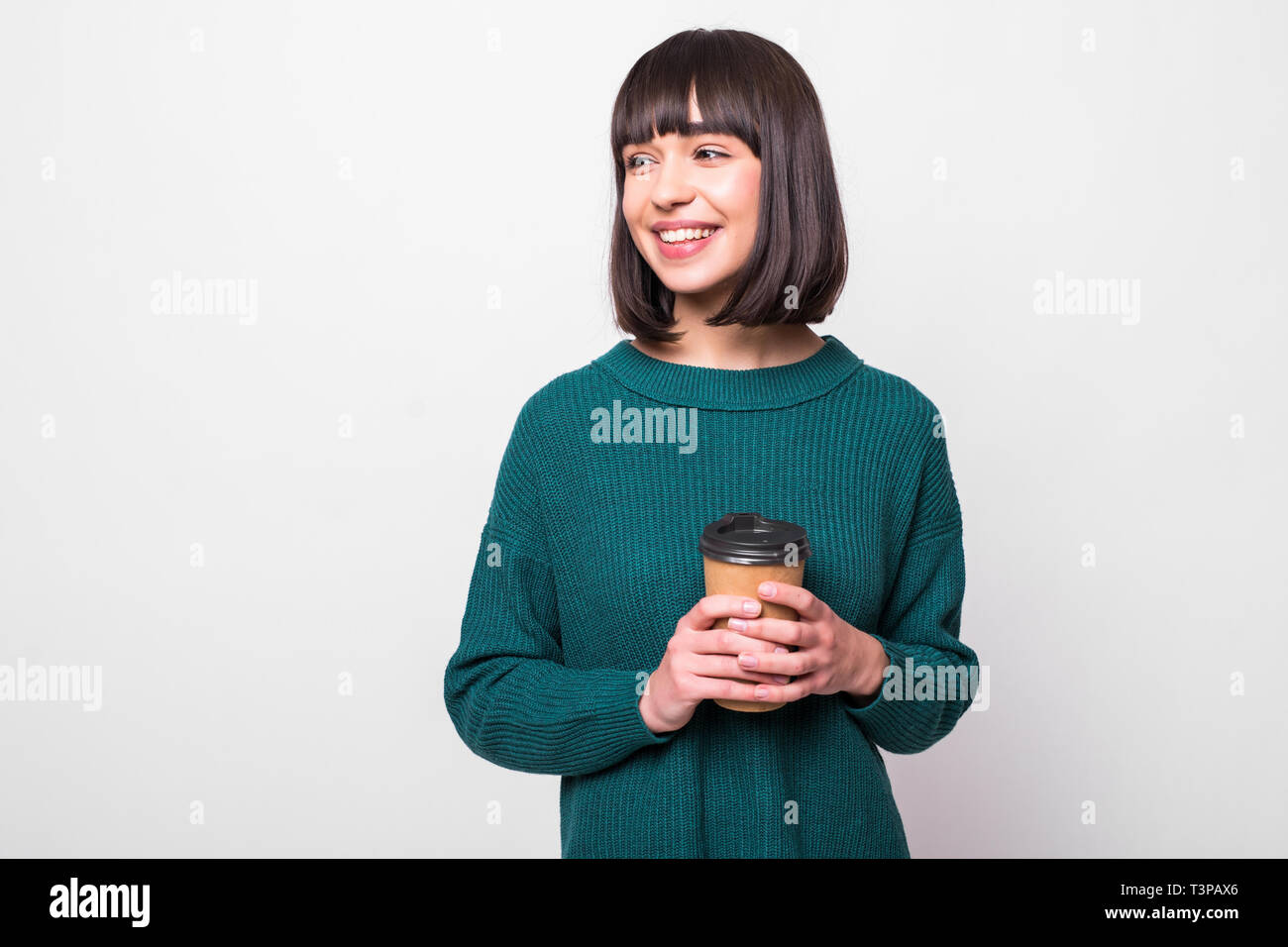 Young woman with cup of coffee isolated on white background Stock Photo ...
