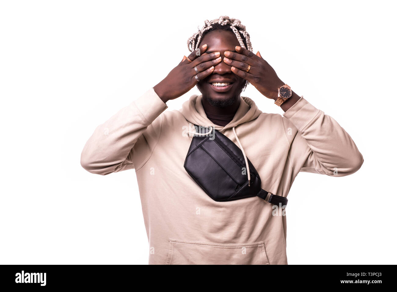 Closeup portrait, young male, shy man closing covering eyes with hands cant see, hiding, isolated white background. See no evil concept. Stock Photo