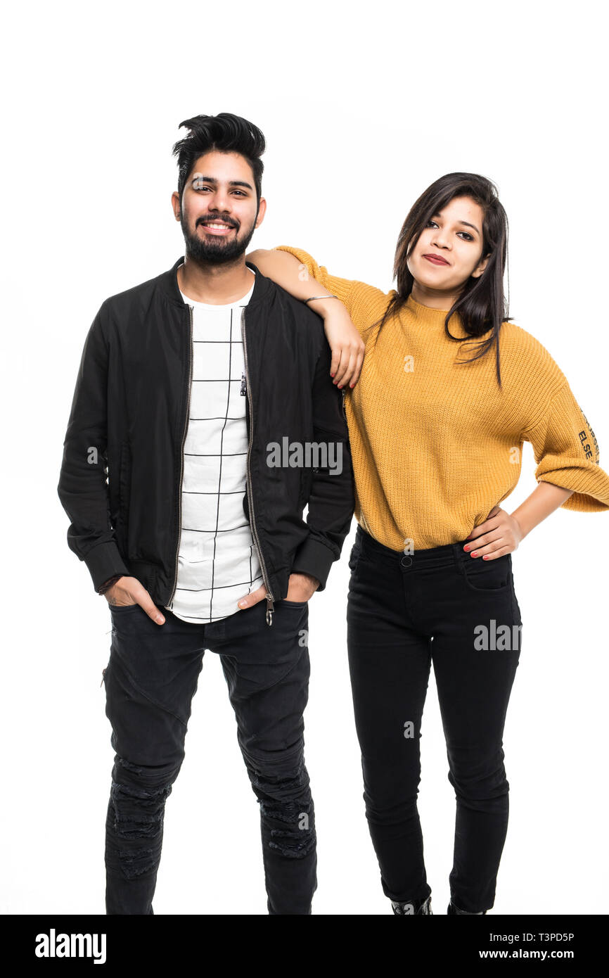 Portrait of beautiful young couple smiling isolated on white background ...