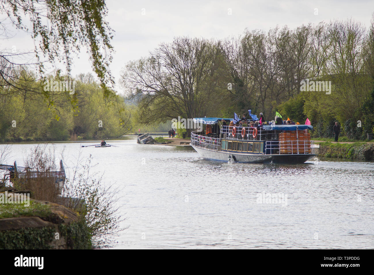 The Oxford branch of Extinction rebellion start their march to London at Folly Bridge, Oxford by taking a Steamer to Abingdon along the River Thames Stock Photo