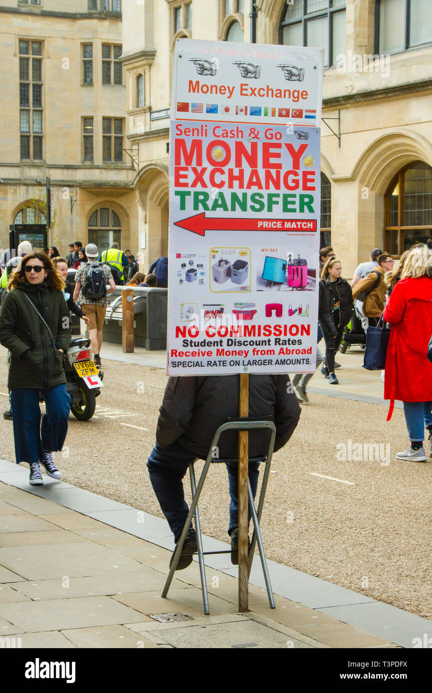An advertising board for Money Exchange Transfer in Oxford Stock Photo