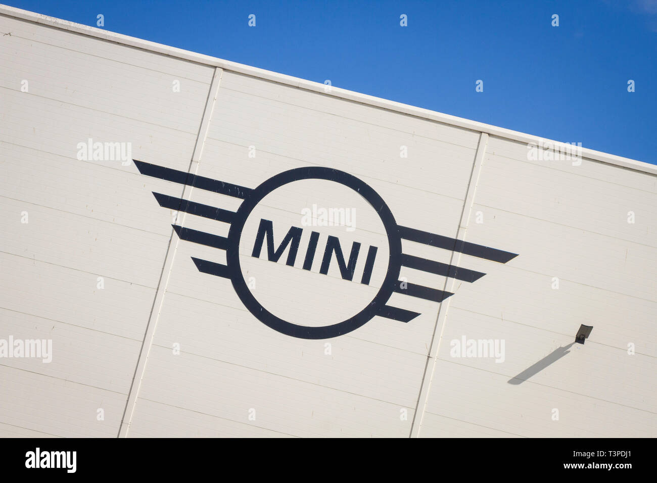The BMW Mini logo sign on the side of the Cowley car plant in Oxford