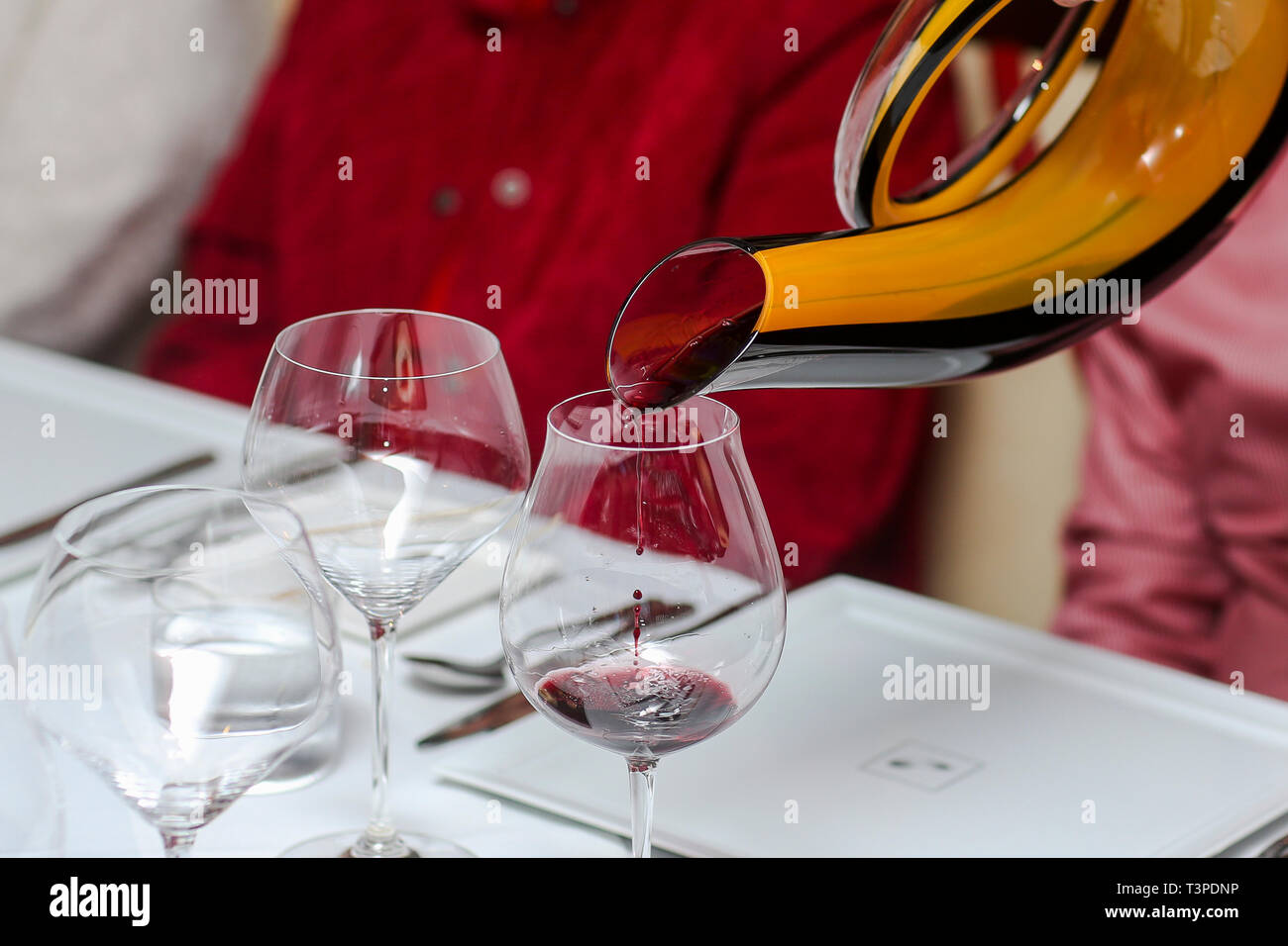 Serving Red wine Stock Photo Alamy
