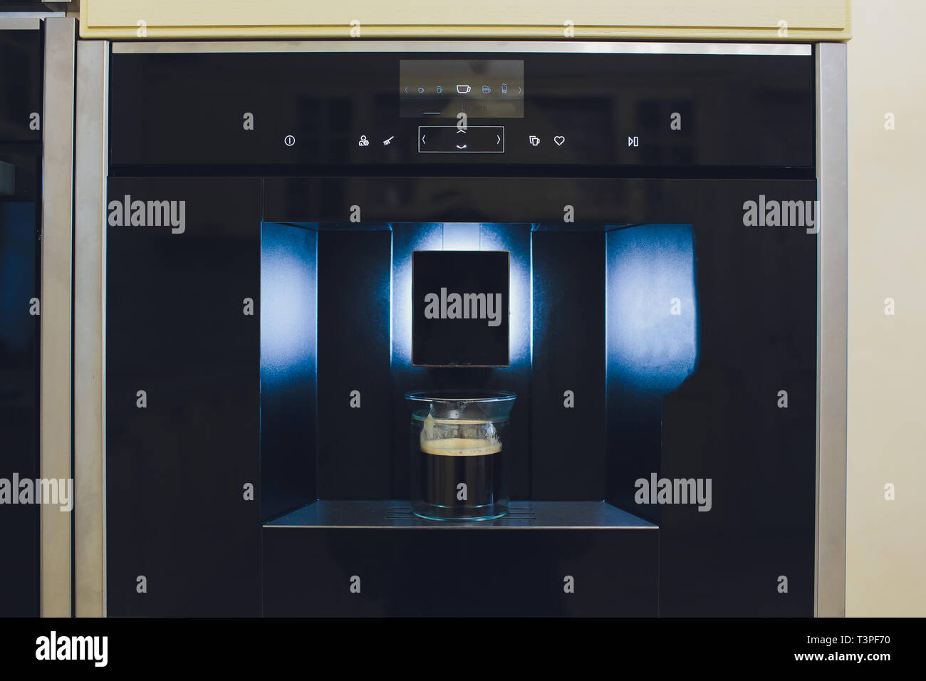 Contemporary kitchen with built in coffee machine Stock Photo Alamy