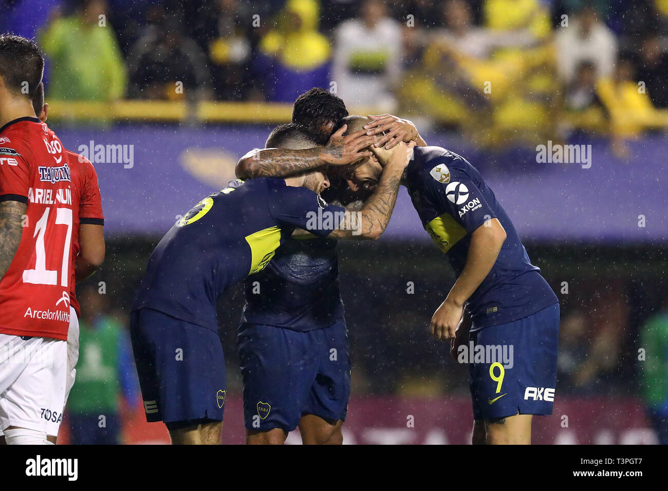 Buenos Aires, Argentina - April 10, 2019: Dario Benedetto, Carlos Tevez and Nathan Nandez hug together in the bombonera in Buenos Aires, Argentina Stock Photo