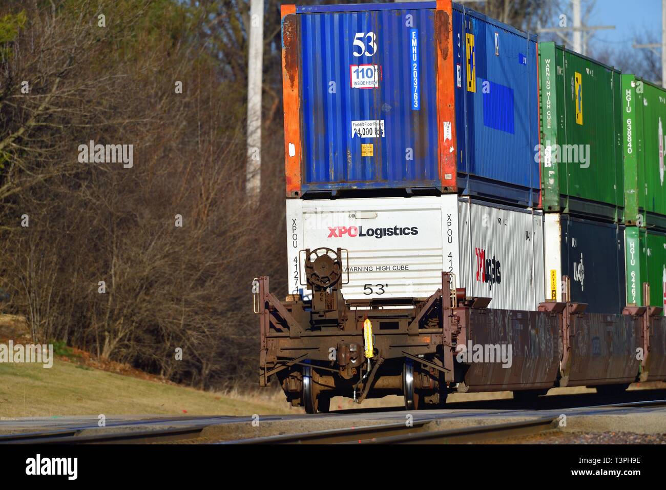 Geneva, Illinois, USA. No longer trailed by a caboose, the end of a Union Pacific stack train of containerized freight moves eastboud through Geneva, Stock Photo