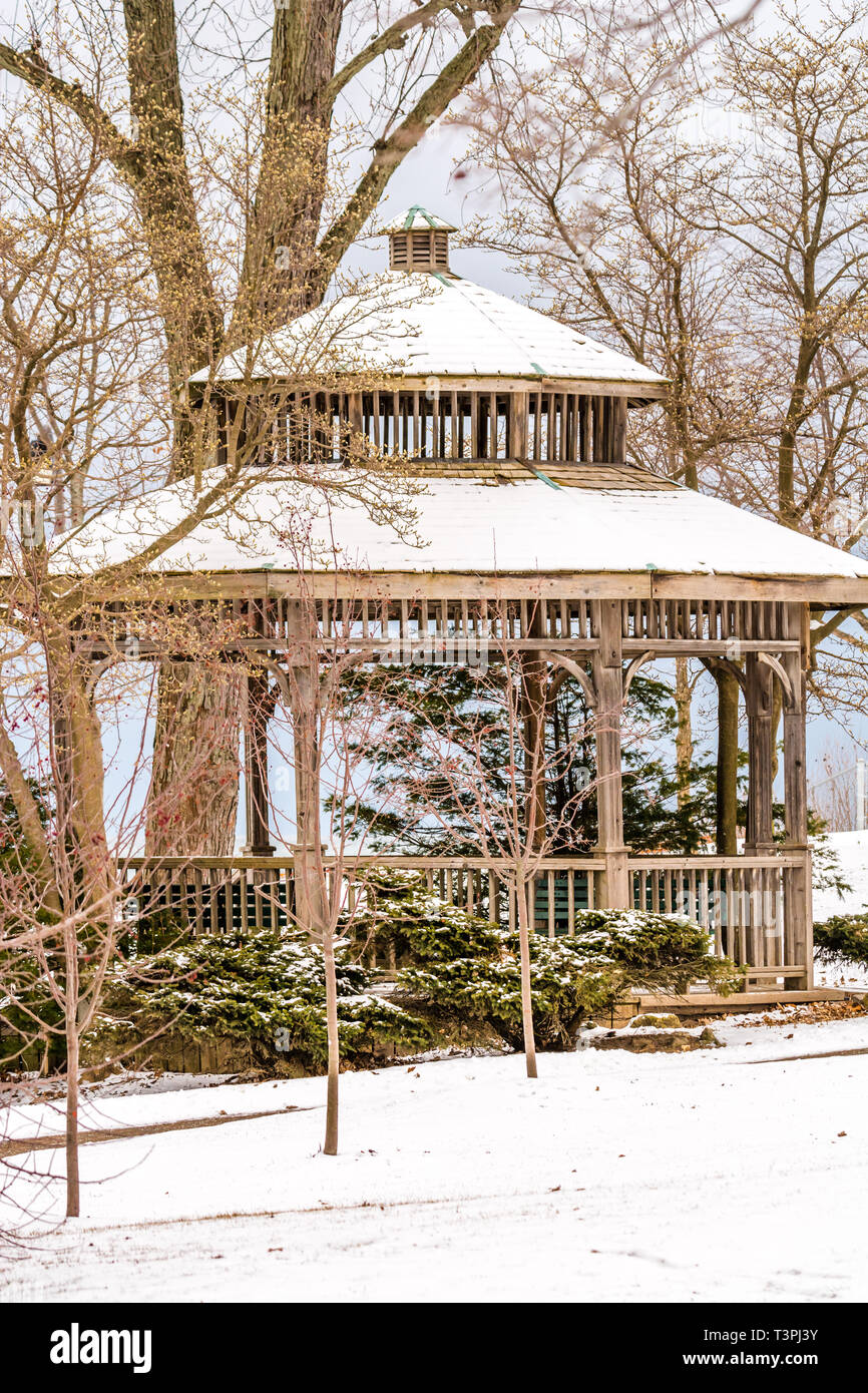 Winter scene of wooden gazebo Stock Photo - Alamy