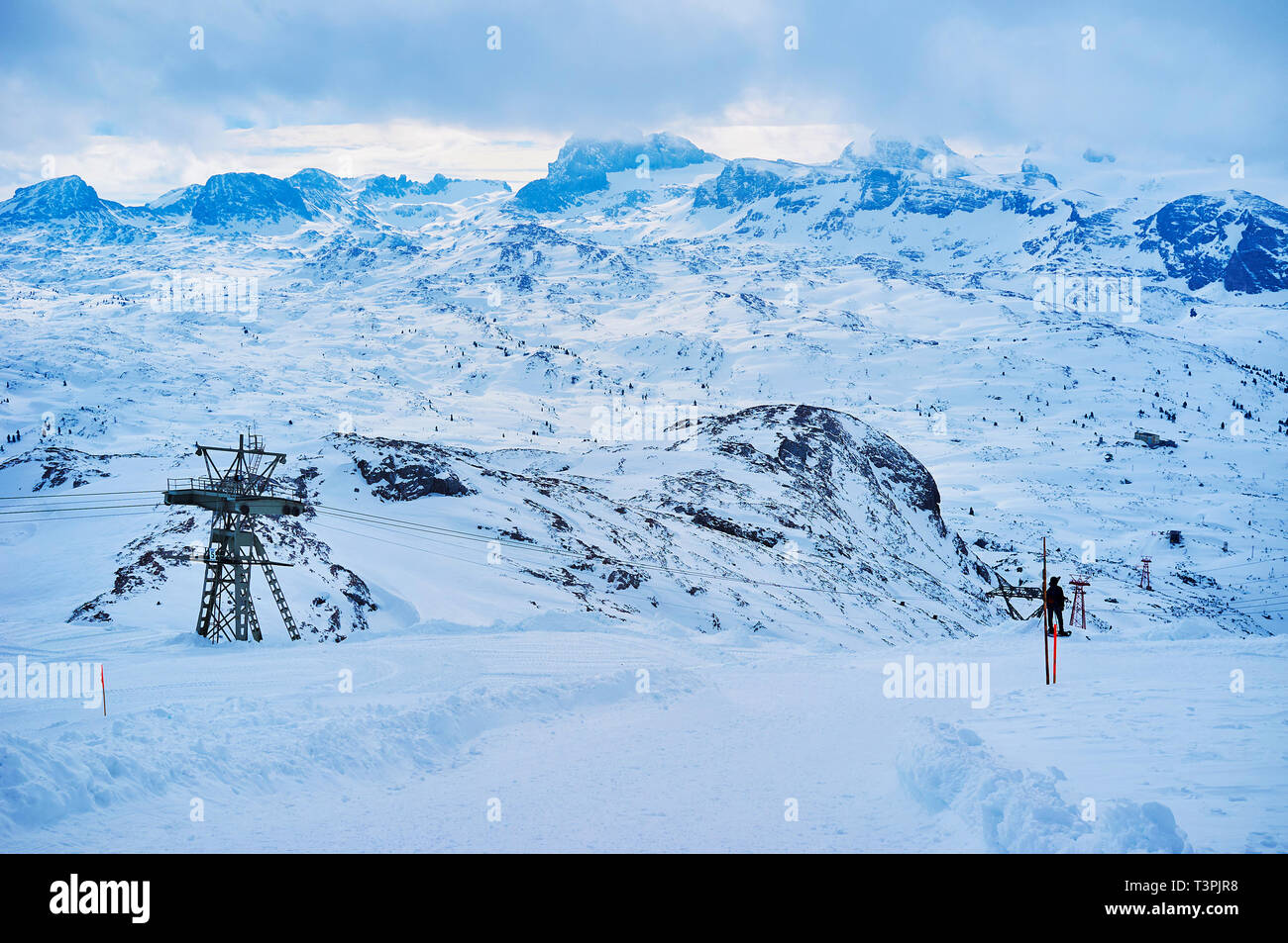 The view from the snowbound Krippenstein slope on the rocky peaks of ...