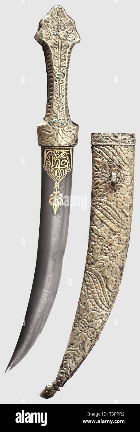 An Ottoman dagger set with coral, mid 19th century Lightly curved,  double-edged, wootz-Damascus blade. Decorative calligraphy and blossom  decoration inlaid in gold on both sides of the forte. The grip made of