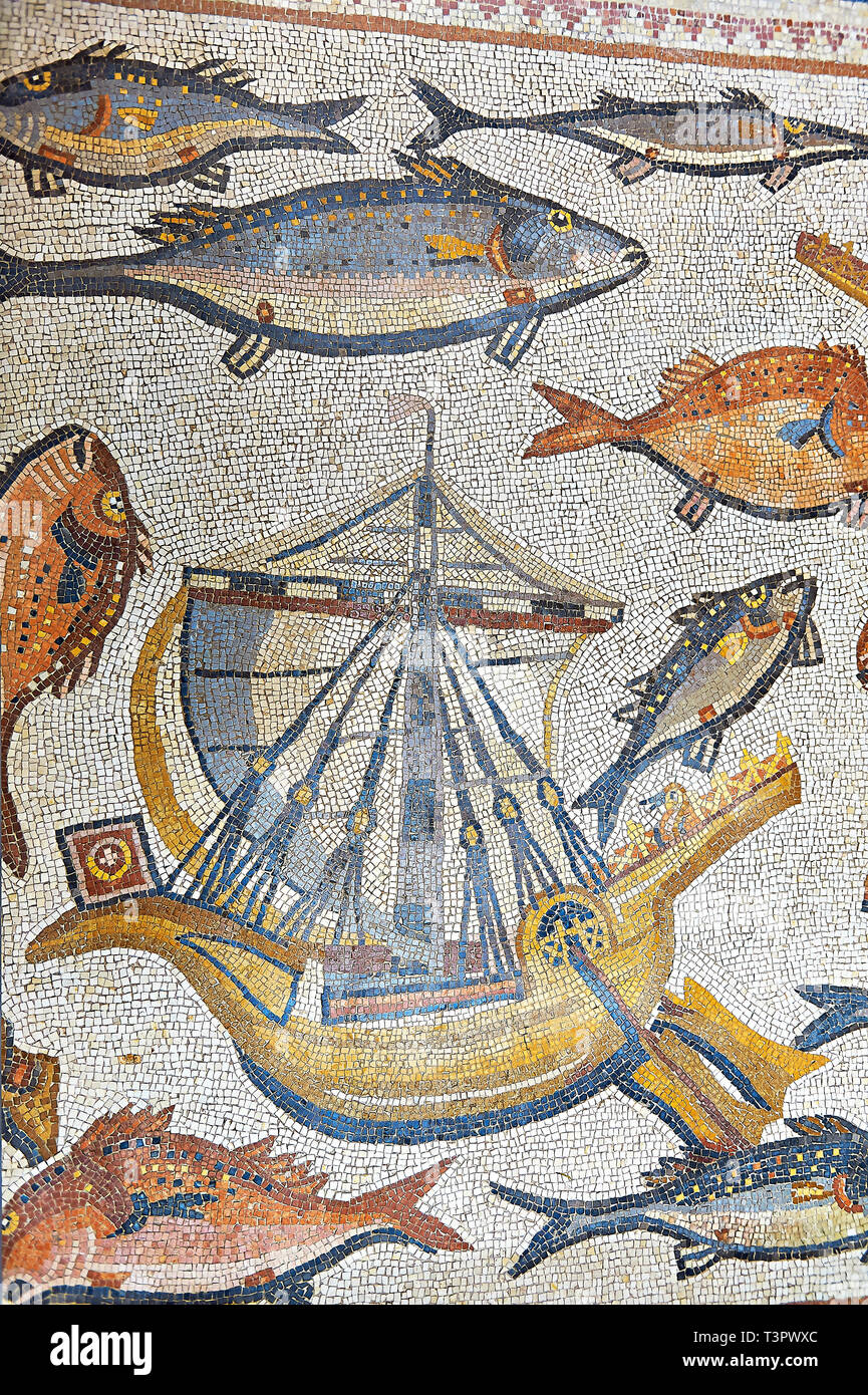 Fish and marine life with a sailing boat from the 3rd century Roman mosaic villa floor from Lod, near Tel Aviv, Israel. The Roman floor mosaic of Lod  Stock Photo