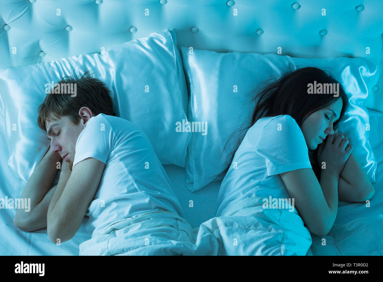 couple sleeping in bed Stock Photo - Alamy