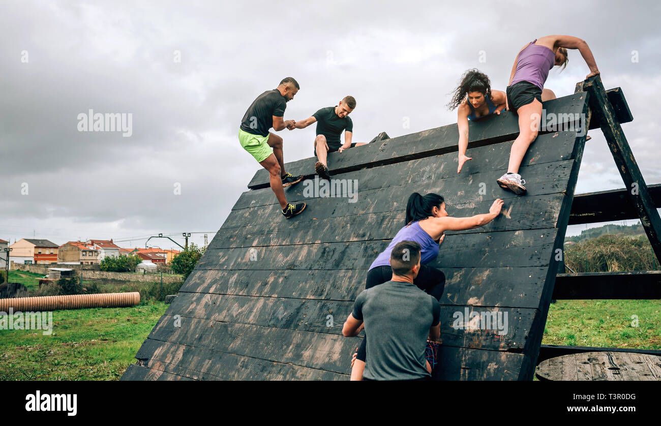 Inverted Pyramid Obstacle Course Participants in obstacle course climbing pyramid obstacle Stock Photo ...