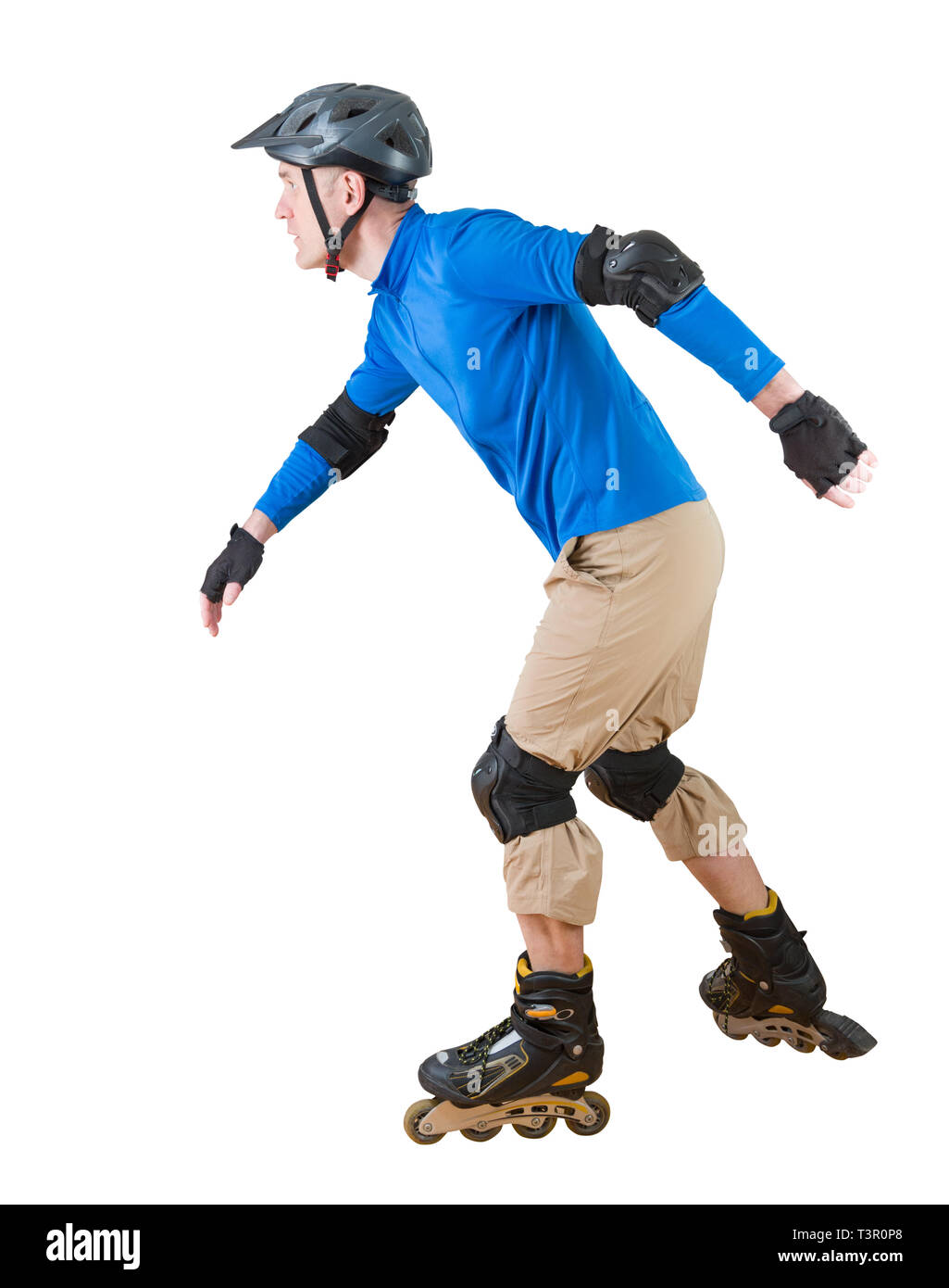 man roller skating with protective sportwear Stock Photo