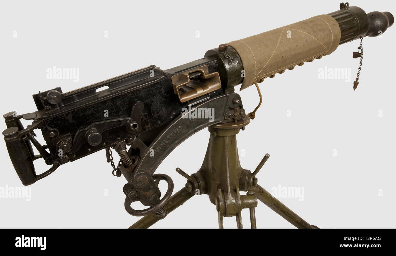 ARMES A FEU, Mitrailleuse Vickers, calibre .303, No.V885, fabr. VAC, modèle  2ème Guerre Mondiale avec rail de lunette, dans sa peinture noire et kakie  d'origine avec trépied MK IV, manchon de toile,