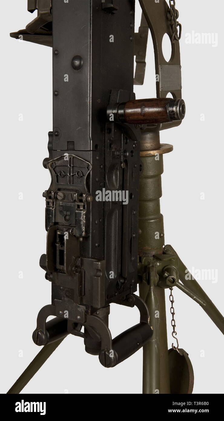 A .50 Caliber Browning Machine Gun with a pile of spent cases and links  Solid-Faced Canvas Print