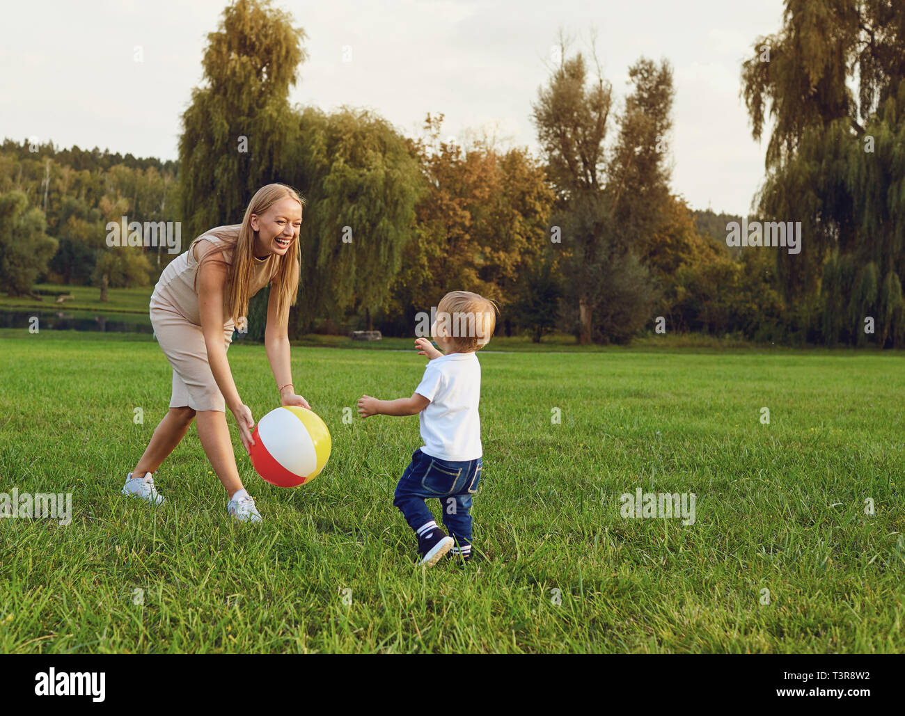 Mother with a child plays in the park. Stock Photo