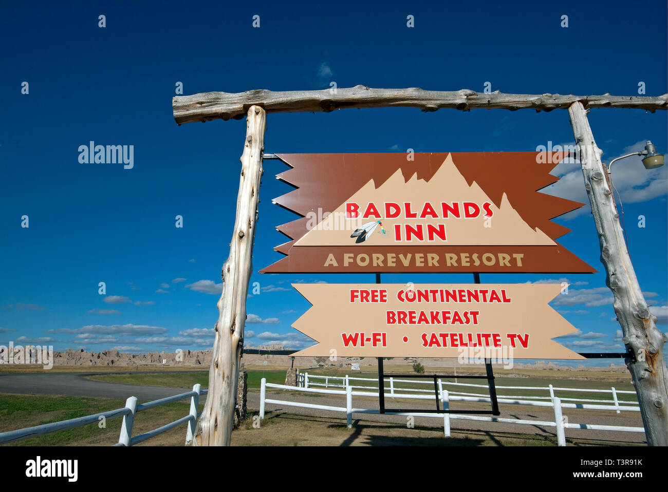 Wooden sign of Badlands Inn, Badlands National Park, South Dakota, USA Stock Photo