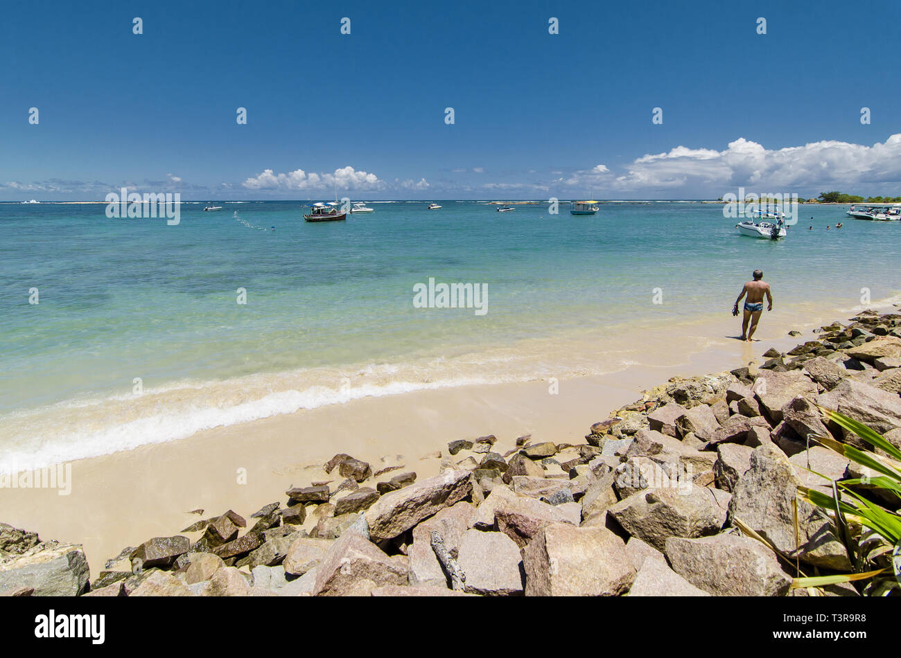Man Walking Down Morro De Sao Paulo Beach In Brazil Stock Photo Alamy