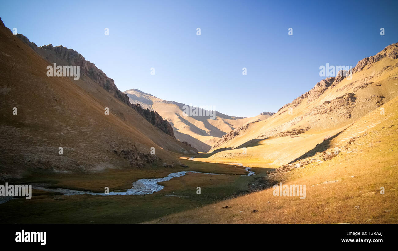 Sunset view to Tash-Rabat river and valley , Naryn province, Kyrgyzstan Stock Photo