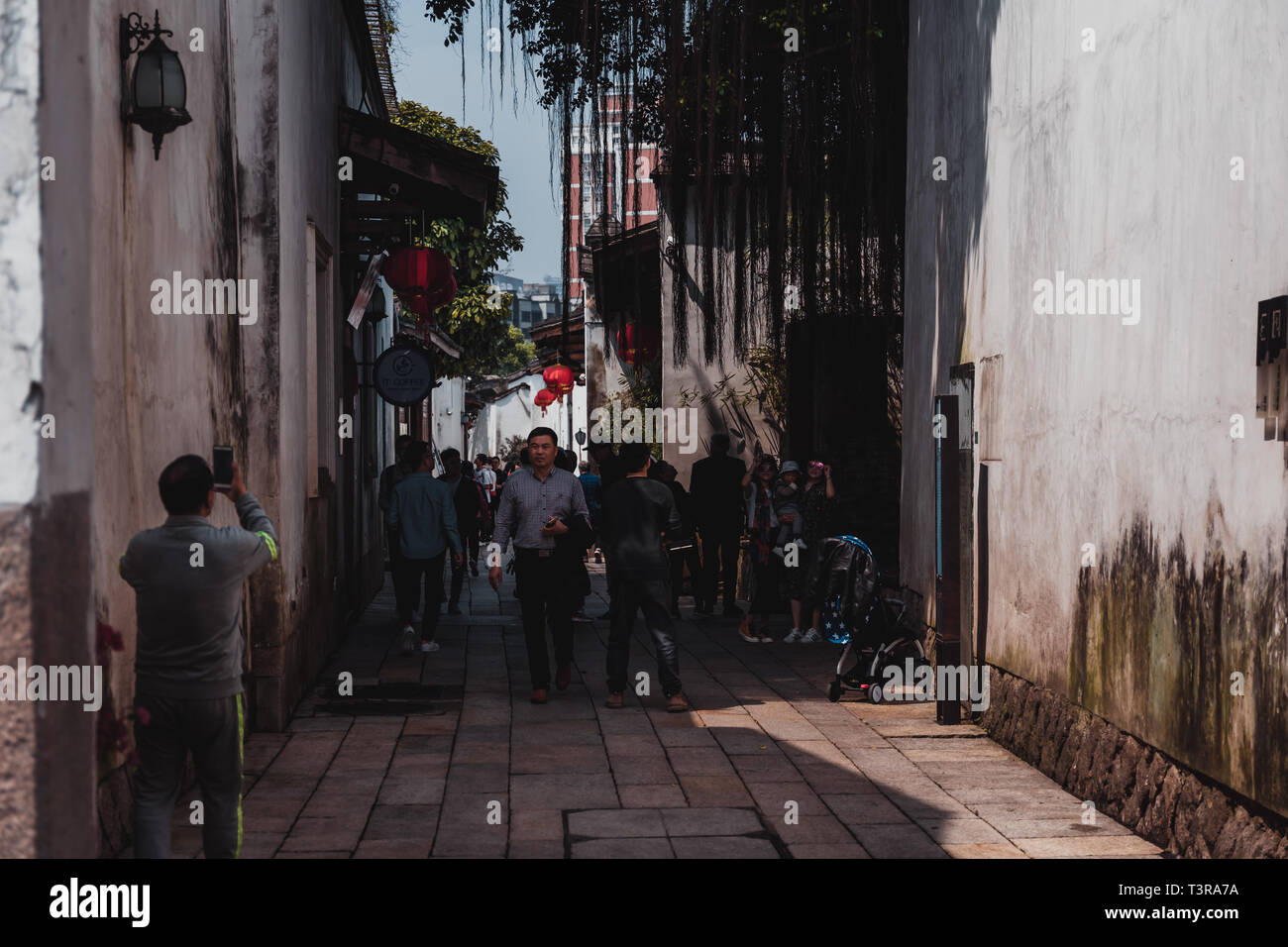 Sanfang Qixiang (Three Lanes and Seven Alleys), Fuzhou, China - 05 April 2019: People visiting the famous travel destination and walking on the Street Stock Photo